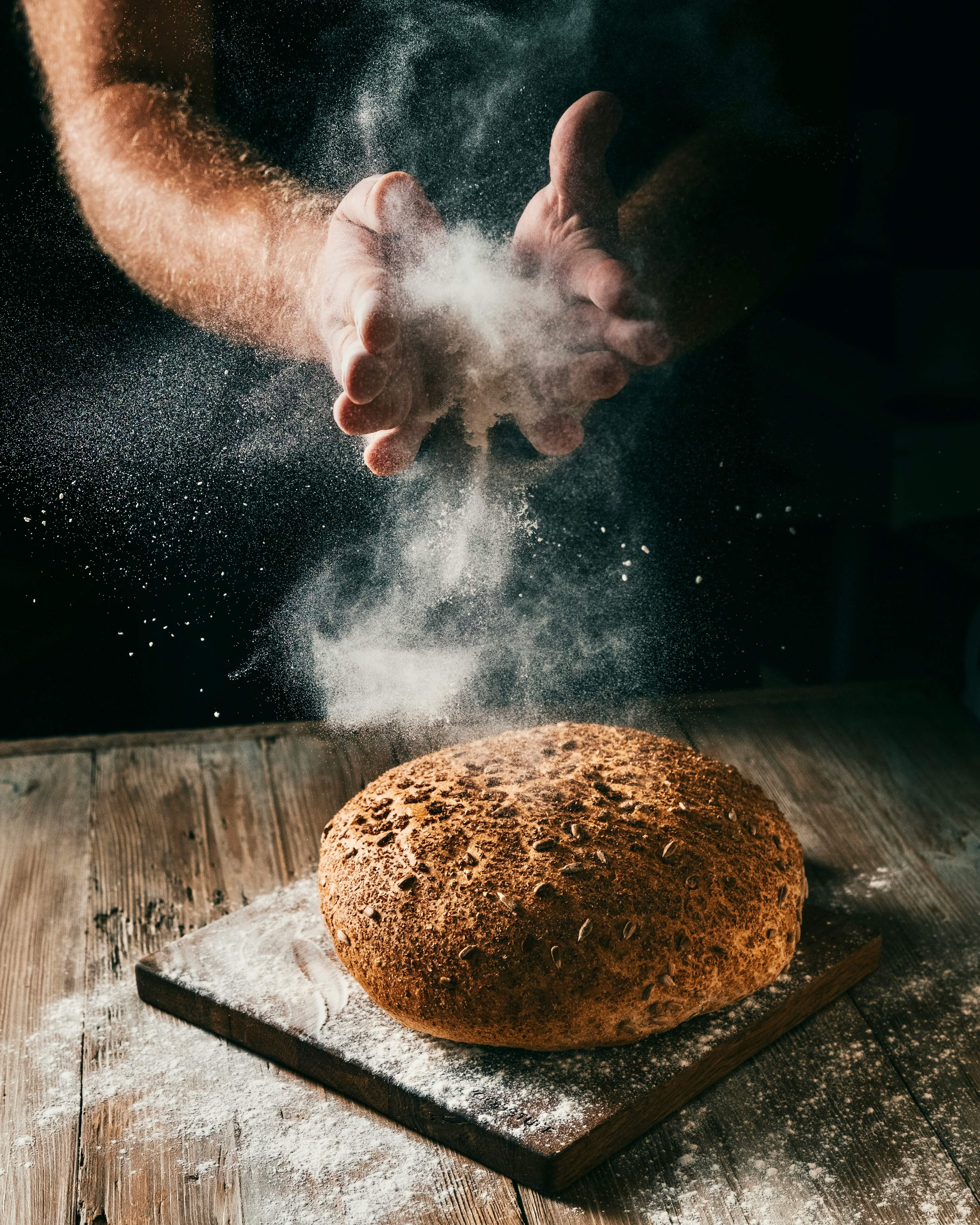 Baker working with dough